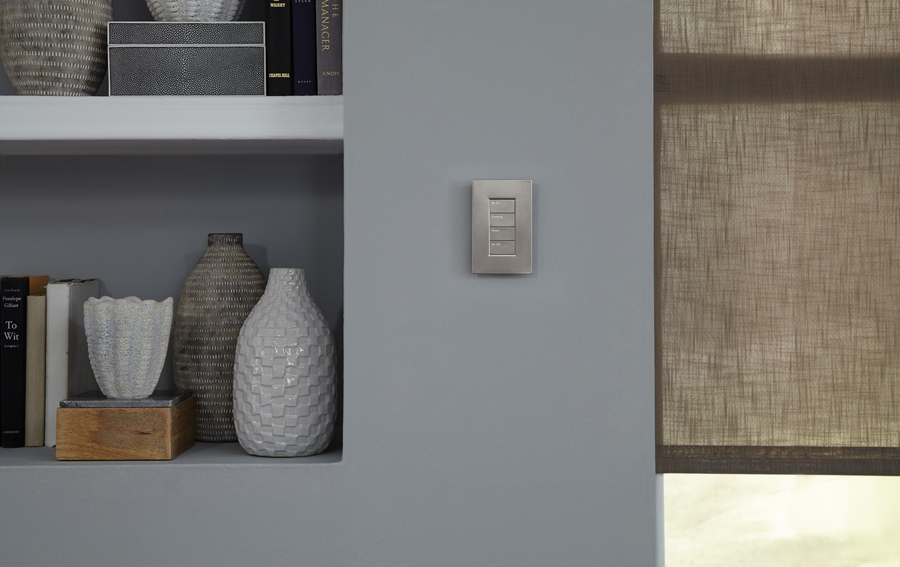 A Sivoia QS smart control switch and motorized shade.
