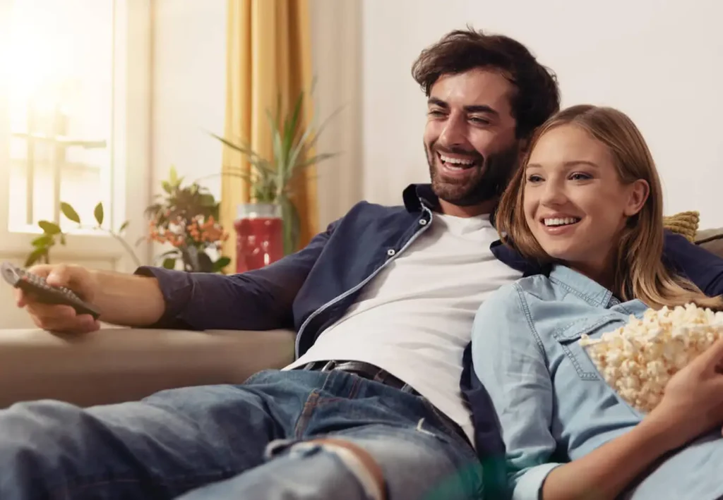 couple enjoying home theater